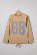 Macy Drawstring Hemline Oversize Long Sleeve Top