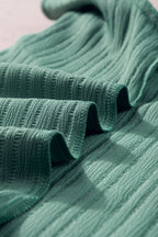 Capri Ruffled Half Sleeve V Neck Textured Top.